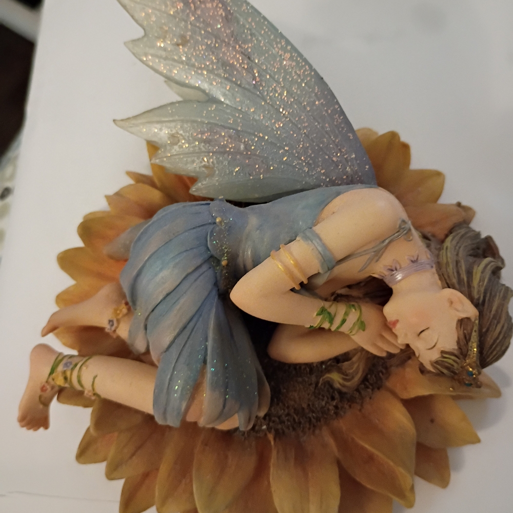 Fairy Figurine on Sunflower by